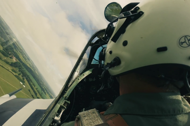 Onboard Minicam shot over shoulder of Spitfire pilot